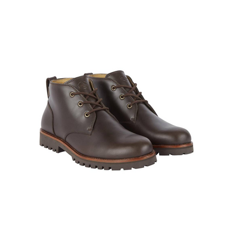 Chaussure Le Chameau La Chukka en cuir pour hommes, bottines imperméables avec semelle crantée offrant confort et durabilité, idéales pour usage en ville ou à la campagne, design élégant et intemporel