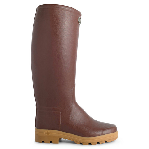 Bottes femmes Le Chameau Saint-Hubert avec doublure en cuir, offrant élégance et imperméabilité pour les activités en plein air, confectionnées artisanalement avec caoutchouc Chamolux et renforts en fibres d’aramide.