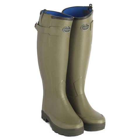 Bottes femme Le Chameau Chasseur doublées en néoprène, étanches avec fermeture éclair imperméable et semelle tout-terrain, protection contre l'abrasion, design confortable adapté aux jambes féminines, idéales pour activités extérieures comme la chasse.