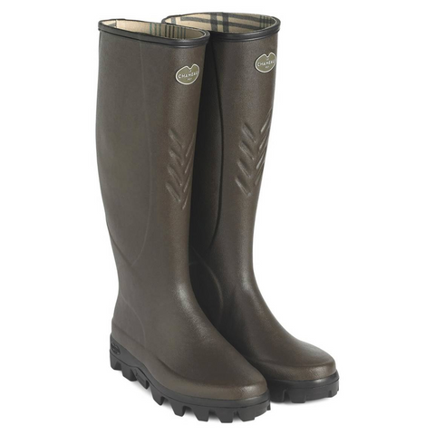 Bottes Le Chameau Saint-Hubert doublées cuir, confection artisanale, équipées de semelles autonettoyantes Michelin, idéales pour activités agricoles, offrant imperméabilité, élégance et confort, adaptées aux professionnels de l'agriculture recherchant adhérence et durabilité.