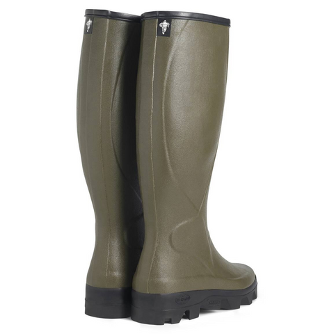 Bottes Le Chameau Saint-Hubert doublées cuir, confection artisanale, équipées de semelles autonettoyantes Michelin, idéales pour activités agricoles, offrant imperméabilité, élégance et confort, adaptées aux professionnels de l'agriculture recherchant adhérence et durabilité.