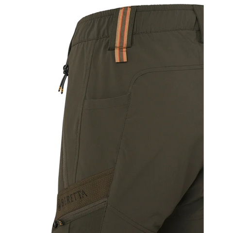 Pantalon de chasse pour femme Beretta Boondock, conçu pour les environnements difficiles avec tissu élastique et polyamide haute ténacité, offrant résistance et mobilité optimale dans les zones de ronces et végétations denses.