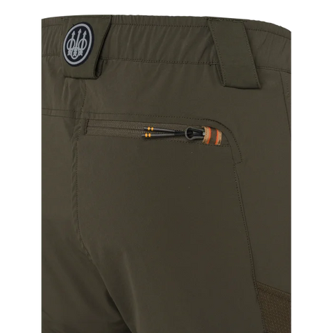 Pantalon de chasse pour femme Beretta Boondock, conçu pour les environnements difficiles avec tissu élastique et polyamide haute ténacité, offrant résistance et mobilité optimale dans les zones de ronces et végétations denses.