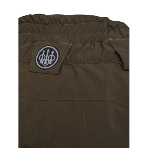 Pantalon de chasse pour femme Tri-Active EVO Beretta en motif Camo Max5, imperméable et respirant avec fermeture YKK et inserts élastiques pour une liberté de mouvement maximale, idéal pour les environnements de chasse en pleine nature.