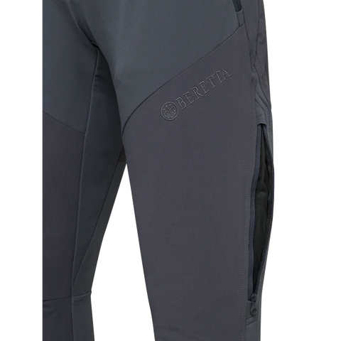 Pantalon de chasse pour femme Beretta 4 Way Stretch conçu pour l'outdoor avec élasticité et résistance, équipé d'inserts anti-abrasion, ventilation zippée, soutien lombaire élevé et coupe slim pour un confort durable dans les activités en automne et hiver.