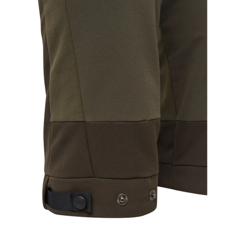 Pantalon de chasse Beretta Muker GTX pour homme, imperméable et respirant, idéal pour une chasse silencieuse. GORE Z-Liner, liberté de mouvement grâce au tissu élastique, zips de ventilation pour confort optimal dans des environnements exigeants