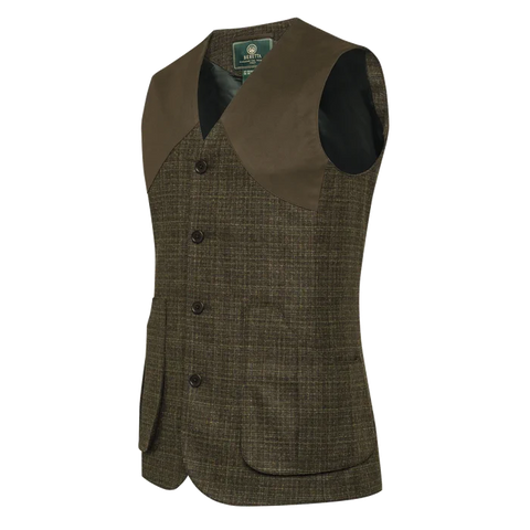 Photo du Gilet Beretta St James, un gilet de chasse en laine et cachemire de haute qualité avec détails en faux daim, idéal pour les battues avec protection anti-recul et style sophistiqué