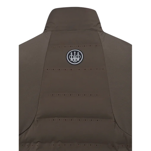Gilet thermique pour homme Beretta Bezoar Hybrid conçu pour la chasse active, offrant respirabilité et thermorégulation grâce au rembourrage Freudenberg Comfortemp®, idéal pour températures entre 0°C et 10°C, fabriqué en nylon résistant, avec perforations laser et poches pratiques.