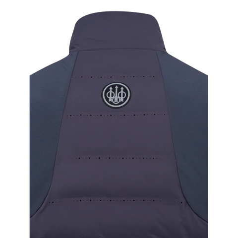 Gilet thermique pour homme Beretta Bezoar Hybrid conçu pour la chasse active, offrant respirabilité et thermorégulation grâce au rembourrage Freudenberg Comfortemp®, idéal pour températures entre 0°C et 10°C, fabriqué en nylon résistant, avec perforations laser et poches pratiques.