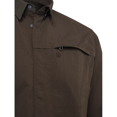 Chemise Beretta Thorn Resistant pour la chasse, offrant une résistance aux épines avec tissu polyester extensible et renforts polyamide, haute visibilité certifiée pour chasseurs, avec une respirabilité optimale et confort en mouvement