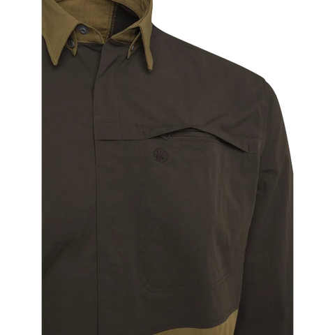 Chemise Beretta Thorn Resistant pour la chasse, offrant une résistance aux épines avec tissu polyester extensible et renforts polyamide, haute visibilité certifiée pour chasseurs, avec une respirabilité optimale et confort en mouvement