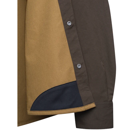 Chemise Beretta Thorn Resistant pour la chasse, offrant une résistance aux épines avec tissu polyester extensible et renforts polyamide, haute visibilité certifiée pour chasseurs, avec une respirabilité optimale et confort en mouvement