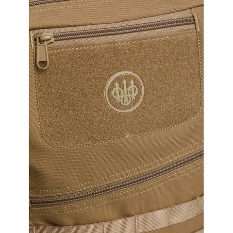 Front view of the Beretta Tactical Flank Backpack showcasing its M.O.L.L.E. system for functional gear arrangement, durable waterproof polyester material, and spacious design perfect for tactical use or daily commutes.