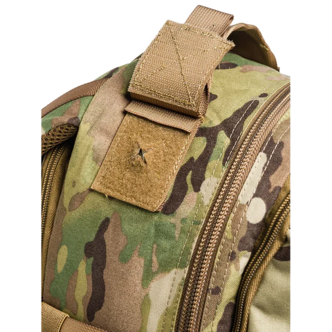 Image of Beretta Tactical Multicam Backpack with 29L capacity featuring M.O.L.L.E. system for outdoor and tactical activities, customizable with velcro patches, designed for durability and organization.