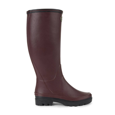 Bottes en caoutchouc naturel pour la marche à la campagne avec doublure en jersey poly-coton ultra-résistante et semelle bi-densité antichoc Le Chameau, offrant confort et adhérence tout terrain, imperméables et fabriquées artisanalement.