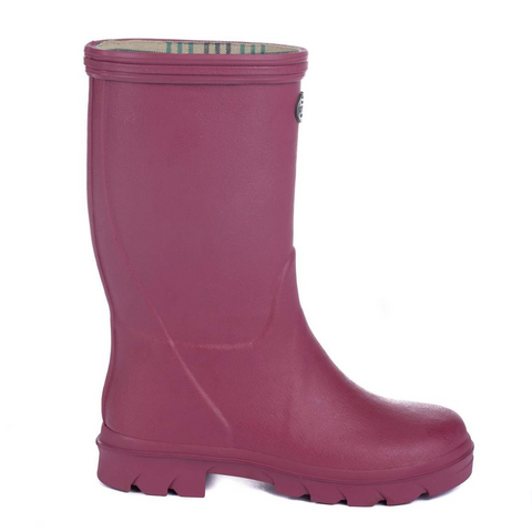 Bottes pour enfants Le Chameau confectionnées à la main avec caoutchouc Chamolux et doublées jersey, parfaites pour aventures en plein air, offrant confort, imperméabilité et style.