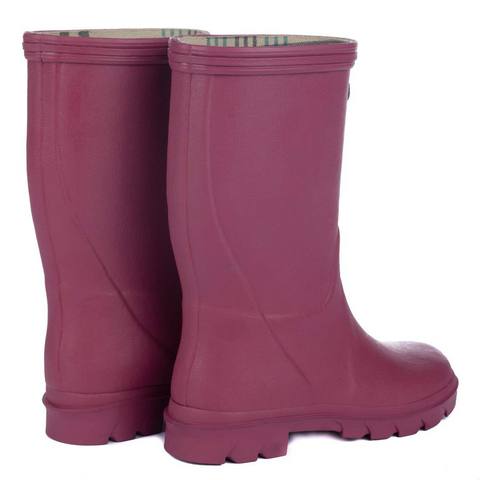 Bottes pour enfants Le Chameau confectionnées à la main avec caoutchouc Chamolux et doublées jersey, parfaites pour aventures en plein air, offrant confort, imperméabilité et style.