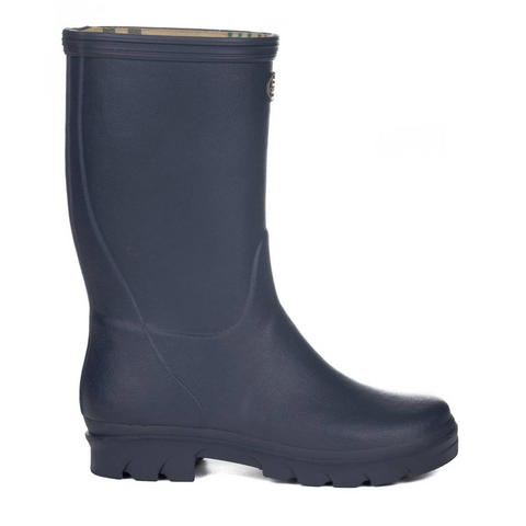 Bottes pour enfants Le Chameau confectionnées à la main avec caoutchouc Chamolux et doublées jersey, parfaites pour aventures en plein air, offrant confort, imperméabilité et style.