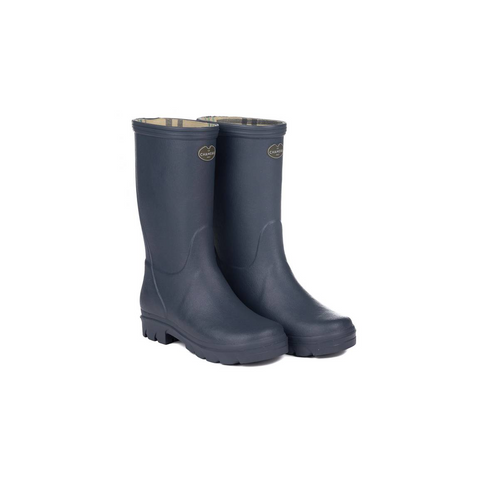 Bottes pour enfants Le Chameau confectionnées à la main avec caoutchouc Chamolux et doublées jersey, parfaites pour aventures en plein air, offrant confort, imperméabilité et style.