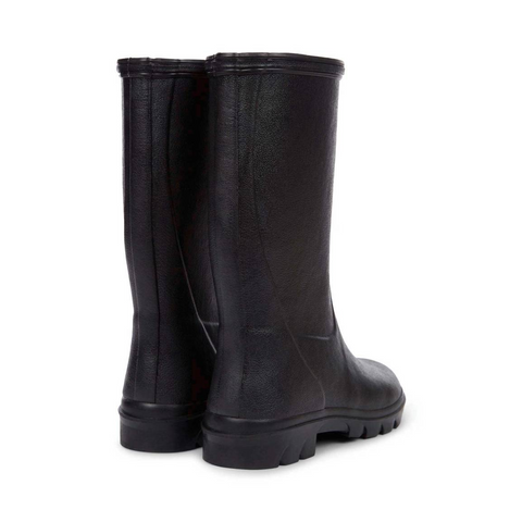 Bottes pour enfants Le Chameau confectionnées à la main avec caoutchouc Chamolux et doublées jersey, parfaites pour aventures en plein air, offrant confort, imperméabilité et style.