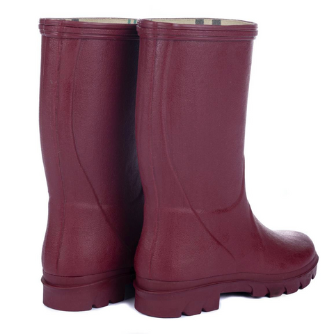 Bottes pour enfants Le Chameau confectionnées à la main avec caoutchouc Chamolux et doublées jersey, parfaites pour aventures en plein air, offrant confort, imperméabilité et style.