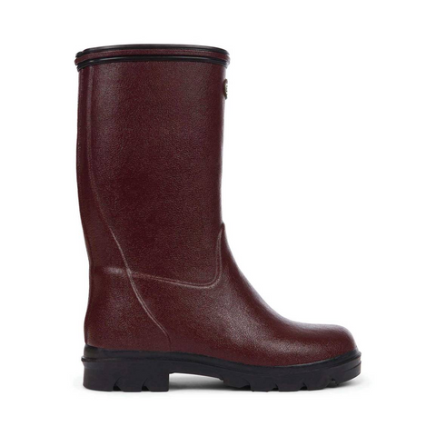 Bottes pour enfants Le Chameau confectionnées à la main avec caoutchouc Chamolux et doublées jersey, parfaites pour aventures en plein air, offrant confort, imperméabilité et style.