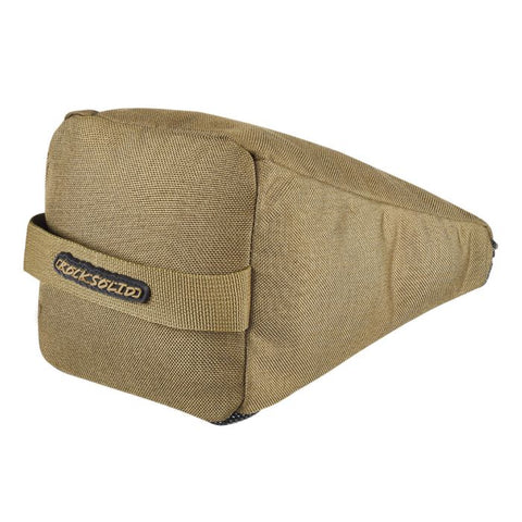 Sac comprimé Rock Solid pour tireurs et chasseurs, offrant un support stable avec tissu résistant à l'eau et aux rayures, idéal pour le stand de tir et la chasse sur terrains accidentés