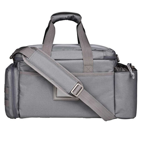 Sac de tir Bergara en polyester gris avec multiples compartiments amovibles, poches zippées et sangles MOLLE, idéal pour armes de poing, chargeurs, et accessoires de tir sportif. Dimensions 43 x 28 x 26 cm, volume 20 litres, avec porte-cartes transparent et double poignée pour transport sécurisé