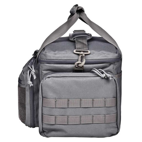 Sac de tir Bergara en polyester gris avec multiples compartiments amovibles, poches zippées et sangles MOLLE, idéal pour armes de poing, chargeurs, et accessoires de tir sportif. Dimensions 43 x 28 x 26 cm, volume 20 litres, avec porte-cartes transparent et double poignée pour transport sécurisé