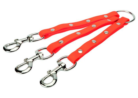 Tripleur Januel orange fabriqué en biothane, dimensions 25x1.6 cm, accessoire idéal pour activités de plein air, durable et résistant aux intempéries. Convient pour une utilisation dans toutes les conditions avec grande visibilité.