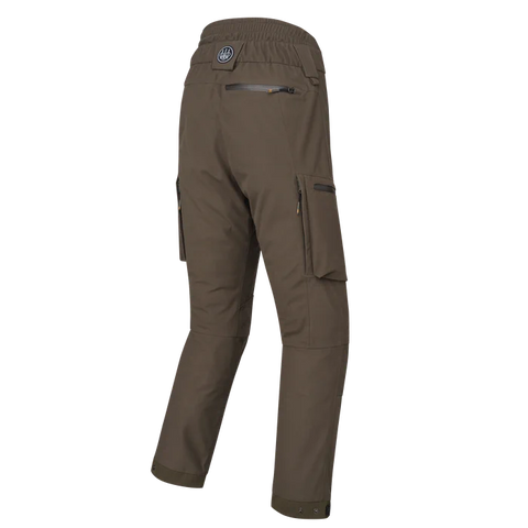 Pantalon de chasse Beretta Bakhold imperméable et respirant, conçu pour le silence et la liberté de mouvement, idéal pour les environnements exigeants. Taille élastique, glissières YKK, et doublure thermique avec membrane BWB EVO pour une protection et un confort optimaux.