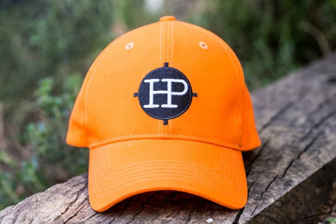 Casquette Hunt Power orange en 100% coton pour chasse et activités en plein air, offrant confort, respirabilité et visibilité accrue