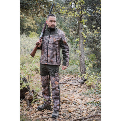 "Veste Treeland Maquisard en motif forestier, modèle T622, alliant durabilité et style pour les activités de plein air et la chasse."