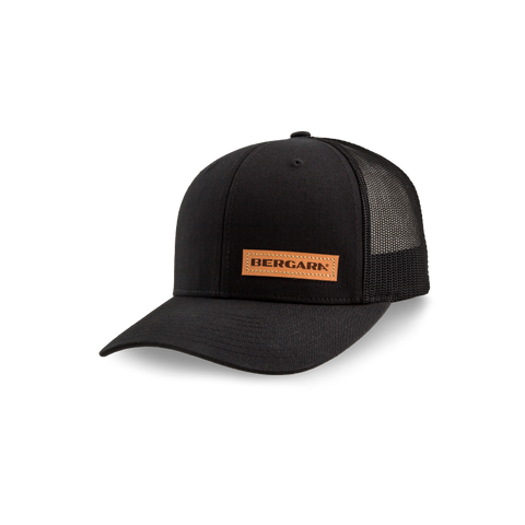 Casquette Bergara Kodiak en style camionneur avec patch en cuir, ajustable pour toutes tailles, offrant protection solaire idéale pour la chasse et l'usage quotidien, modèle unisexe en coton polyester légères et respirantes