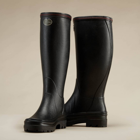 Bottes en caoutchouc naturel pour la marche à la campagne avec doublure en jersey poly-coton ultra-résistante et semelle bi-densité antichoc Le Chameau, offrant confort et adhérence tout terrain, imperméables et fabriquées artisanalement.
