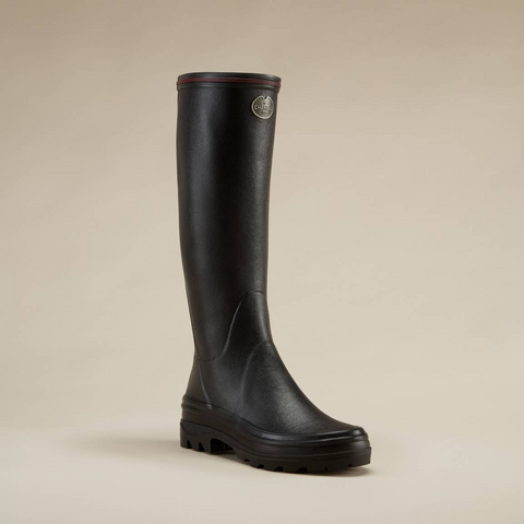 Bottes en caoutchouc naturel pour la marche à la campagne avec doublure en jersey poly-coton ultra-résistante et semelle bi-densité antichoc Le Chameau, offrant confort et adhérence tout terrain, imperméables et fabriquées artisanalement.