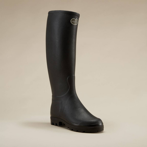 Bottes femmes Le Chameau Saint-Hubert avec doublure en cuir, offrant élégance et imperméabilité pour les activités en plein air, confectionnées artisanalement avec caoutchouc Chamolux et renforts en fibres d’aramide.
